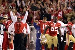 SAN FRANCISCO - SEPTEMBER 20:  Vernon Davis #85 and head coach Mike Singletary of the San Francisco 49ers celebrate a two-point conversion ruling was reversed in their favor due to instant replay during their game against the New Orleans Saints at Candlestick Park on September 20, 2010 in San Francisco, California.  (Photo by Ezra Shaw/Getty Images)