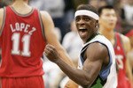 MINNEAPOLIS, MN - OCTOBER 28: Jonny Flynn #10 of the Minnesota Timberwolves celebrates after being fouled late in the fourth quarter by the New Jersey Nets at the Target Center on October 28, 2009 in Minneapolis, Minnesota. The Timberwolves defeated the Nets 95-93. (Photo by Genevieve Ross/Getty Images)