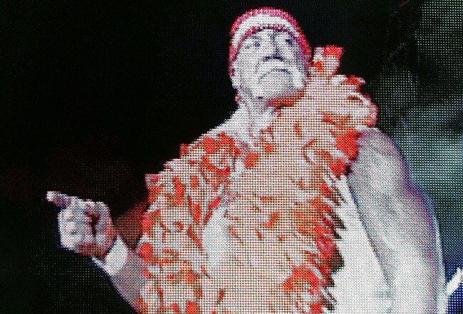 PERTH, AUSTRALIA - NOVEMBER 24:  Hulk Hogan enters the stage prior to his bout against Rick Flair during the Hulkamania Tour at the Burswood Dome on November 24, 2009 in Perth, Australia.  (Photo by Paul Kane/Getty Images)
