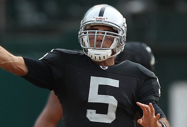 OAKLAND, CA - SEPTEMBER 19:  Bruce Gradkowski #5 of the Oakland Raiders passes against the St. Louis Rams during an NFL game at Oakland-Alameda County Coliseum on September 19, 2010 in Oakland, California.  (Photo by Jed Jacobsohn/Getty Images)