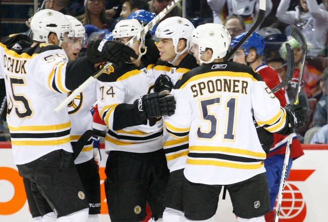 MONTREAL, CANADA - SEPTEMBER 22:  Nathan Horton #18 of the Boston Bruins celebrates his first period goal with team mates during an NHL preseason game against the Montreal Canadiens at the Bell Centre on September 22, 2010 in Montreal, Quebec, Canada.  The Bruins defeated the Canadiens 4-2.  (Photo by Richard Wolowicz/Getty Images)