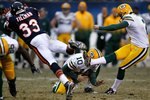 CHICAGO - DECEMBER 13: Charles Tillman #33 of the Chicago Bears tries to block a field goal attempt by Mason Crosby #2 of the Green Bay Packers out of the hold of Matt Flynn #10 at Soldier Field on December 13, 2009 in Chicago, Illinois. The Packers defeated the Bears 21-14. (Photo by Jonathan Daniel/Getty Images)