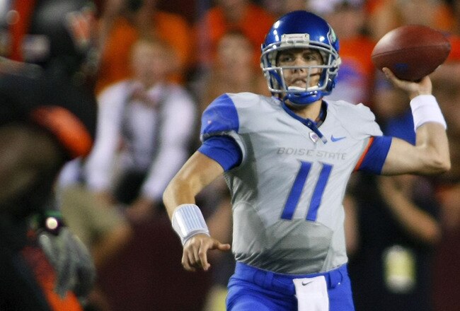 LANDOVER, MD - SEPTEMBER 06:  Quarterback Kellen Moore #11 of the Boise State Broncos passes against the Virginia Tech Hokies at FedExField on September 6, 2010 in Landover, Maryland.  (Photo by Geoff Burke/Getty Images)