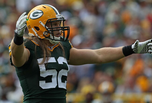 GREEN BAY, WI - SEPTEMBER 19: Clay Matthews #52 of the Green Bay Packers encourages the crowd during a game against the Buffalo Bills at Lambeau Field on September 19, 2010 in Green Bay, Wisconsin. The Packers defeated the Bills 34-7.  (Photo by Jonathan Daniel/Getty Images)