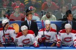 BUFFALO, NY - OCTOBER 3:  Assistant Coach Kirk Mueller and Head Coach Jacques Martin of the Montreal Canadiens look on from behind the bench during their NHL game against the Buffalo Sabres at HSBC Arena on October 3, 2009 in Buffalo, New York. The Canadiens defeated the Sabres 2-1 in overtime. (Photo by Rick Stewart/Getty Images)