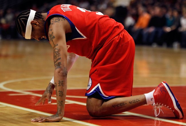 CHICAGO - FEBRUARY 20: Allen Iverson #3 of the Philadelphia 76ers is slow to get up after being hit in the face during a game against the Chicago Bulls at the United Center on February 20, 2010 in Chicago, Illinois. The Bulls defeated the 76ers 122-90. NOTE TO USER: User expressly acknowledges and agrees that, by downloading and/or using this Photograph, User is consenting to the terms and conditions of the Getty Images License Agreement. (Photo by Jonathan Daniel/Getty Images)