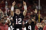 PALO ALTO, CA - SEPTEMBER 18:  Andrew Luck #12 and Richard Sherman #9 of the Stanford Cardinal celebrate from the sidelines after Stanford scored a touchdown to go up 67-24 in the fourth quarter of their game against the Wake Forest Demon Deacons at Stanford Stadium on September 18, 2010 in Palo Alto, California.  (Photo by Ezra Shaw/Getty Images)