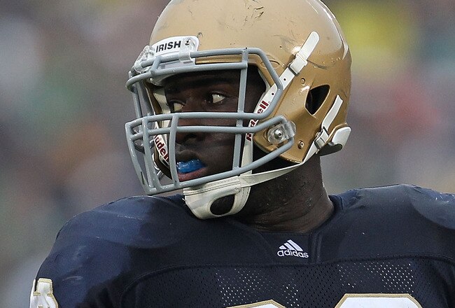 SOUTH BEND, IN - SEPTEMBER 11: Kapron Lewis-Moore #89 of the Notre Dame Fighting Irish looks to bench for instructions against the Michigan Wolverines at Notre Dame Stadium on September 11, 2010 in South Bend, Indiana. Michigan defeated Notre Dame 28-24. (Photo by Jonathan Daniel/Getty Images)