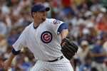CHICAGO - SEPTEMBER 05: Starting pitcher Ryan Dempster #46 of the Chicago Cubs delivers the ball against the New York Mets at Wrigley Field on September 5, 2010 in Chicago, Illinois. The Mets defeated the Cubs 18-5. (Photo by Jonathan Daniel/Getty Images)