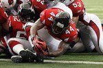 ATLANTA - SEPTEMBER 19:  Jason Snelling #44 of the Atlanta Falcons dives over for a touchdown against the Arizona Cardinals at Georgia Dome on September 19, 2010 in Atlanta, Georgia.  (Photo by Kevin C. Cox/Getty Images)