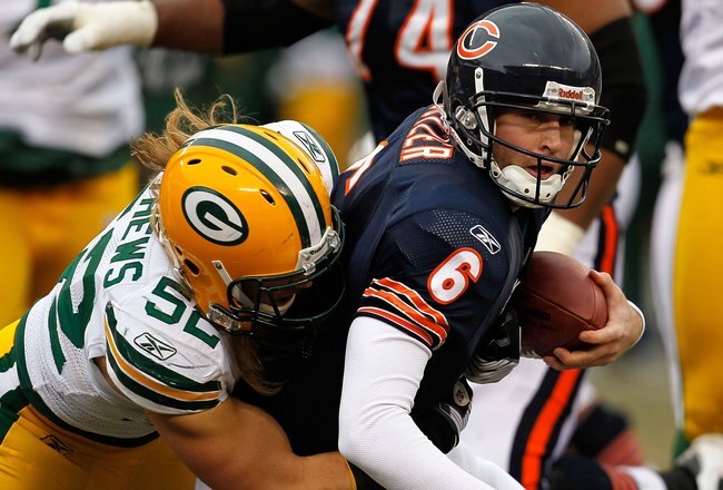 CHICAGO - DECEMBER 13: Clay Matthews #52 of the Green Bay Packers sacks Jay Cutler #6 of the Chicago Bears at Soldier Field on December 13, 2009 in Chicago, Illinois. The Packers defeated the Bears 21-14. (Photo by Jonathan Daniel/Getty Images)