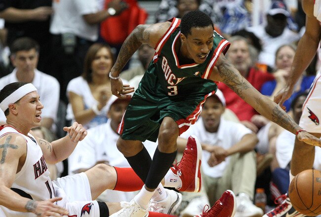 ATLANTA - MAY 2:  Guard Brandon Jennings #3 of the Milwaukee Bucks loses the ball while guard Mike Bibby #10 of the Atlanta Hawks defends him during Game Seven of the Eastern Conference Quarterfinals during the 2010 NBA Playoffs at Philips Arena on May 2, 2010 in Atlanta, Georgia. The Hawks beat the Bucks 95-74.  NOTE TO USER: User expressly acknowledges and agrees that, by downloading and/or using this photograph, user is consenting to the terms and conditions of the Getty Images License Agreement.  (Photo by Mike Zarrilli/Getty Images)