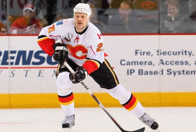 GLENDALE, AZ - JANUARY 28:  Olli Jokinen #21 of the Calgary Flames skates with the puck during the NHL game against the Phoenix Coyotes at Jobing.com Arena on January 28, 2010 in Glendale, Arizona. The Coyotes defeated the Flames 3-2 in an overtime shootout.  (Photo by Christian Petersen/Getty Images)