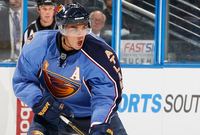 ATLANTA - SEPTEMBER 21:  Evander Kane #9 of the Atlanta Thrashers controls the puck against the Columbus Blue Jackets during the preseason opener at Phillips Arena on September 21, 2010 in Atlanta, Georgia.  (Photo by Kevin C. Cox/Getty Images)