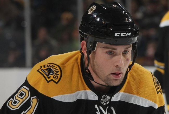 BOSTON - DECEMBER 02:  Marc Savard #91 of the Boston Bruins skates against the Tampa Bay Lightning at the TD Bank Garden on December 2, 2009 in Boston, Massachusetts.  (Photo by Bruce Bennett/Getty Images)