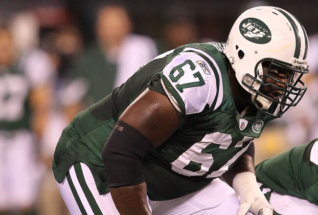 EAST RUTHERFORD, NJ - AUGUST 27:  Damien Woody #67 of the New York Jets in action against the Washington Redskins  during their preseason game on August 27, 2010 at the New Meadowlands Stadium  in East Rutherford, New Jersey.  (Photo by Al Bello/Getty Images)
