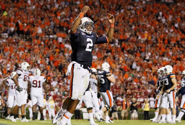 AUBURN, AL - SEPTEMBER 25:  Quarterback Cameron Newton #2 of the Auburn Tigers reacts after rushing in a touchdown against the South Carolina Gamecocks at Jordan-Hare Stadium on September 25, 2010 in Auburn, Alabama.  (Photo by Kevin C. Cox/Getty Images)