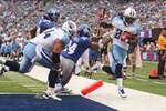 EAST RUTHERFORD, NJ - SEPTEMBER 26:  Chris Johnson #28 of the Tennessee Titans is pushed out of bounds at the endzone by Terrell Thomas #24 of the New York Giants at New Meadowlands Stadium on September 26, 2010 in East Rutherford, New Jersey.  (Photo by Mike Ehrmann/Getty Images)