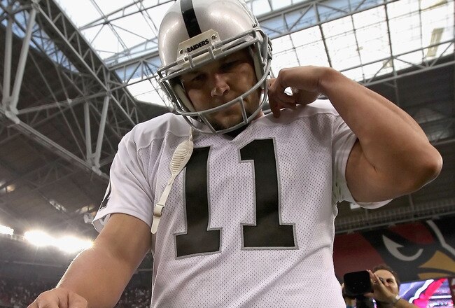 GLENDALE, AZ - SEPTEMBER 26:  Kicker Sebastian Janikowski #11 of the Oakland Raiders walks off the field after missing the game winning 32 yard field goal against the Arizona Cardinals during the NFL game at the University of Phoenix Stadium on September 26, 2010 in Glendale, Arizona. The Cardinals defeated the Raiders 24-23.  (Photo by Christian Petersen/Getty Images)