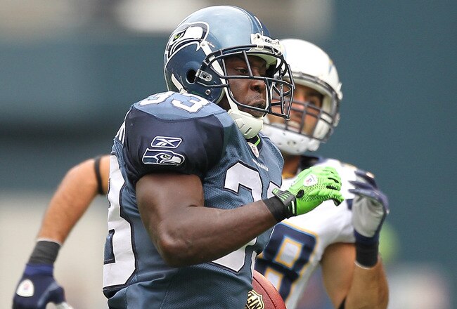 SEATTLE - SEPTEMBER 26:  Kick returner Leon Washington #33 of the Seattle Seahawks rushes for a 101 yard kickoff return for a touchdown in the third quarter against Steve Gregory #28 of the San Diego Chargers at Qwest Field on September 26, 2010 in Seattle, Washington. The Seahawks defeated the Chargers 27-20. (Photo by Otto Greule Jr/Getty Images)