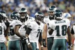 DETROIT - SEPTEMBER 19:  Michael Vick #7 of the Philadelphia Eagles calls the play in the huddle during the third quarter of the game against the Detroit Lions at Ford Field on September 19, 2010 in Detroit, Michigan. The Eagles defeated the Lions 35-32.  (Photo by Leon Halip/Getty Images)