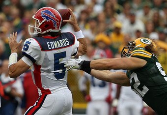 GREEN BAY, WI - SEPTEMBER 19: Trent Edwards #5 of a Buffalo Bills tries to equivocate Clay Matthews #52 of a Green Bay Packers during Lambeau Field upon Sep 19, 2010 in Green Bay, Wisconsin. The Packers degraded a Bills 34-7. (Photo by Jonathan Daniel/Getty Images)