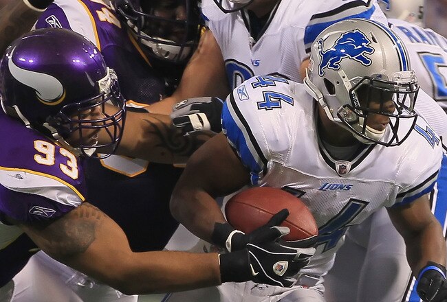 MINNEAPOLIS - SEPTEMBER 26:  Running back Jahvid Best #44 of the Detroit Lions is pursued by Kevin Williams #93 of the Minnesota Vikings during the first half at Hubert H. Humphrey Metrodome on September 26, 2010 in Minneapolis, Minnesota. The Vikings defeated the Lions 24-10.  (Photo by Jeff Gross/Getty Images)