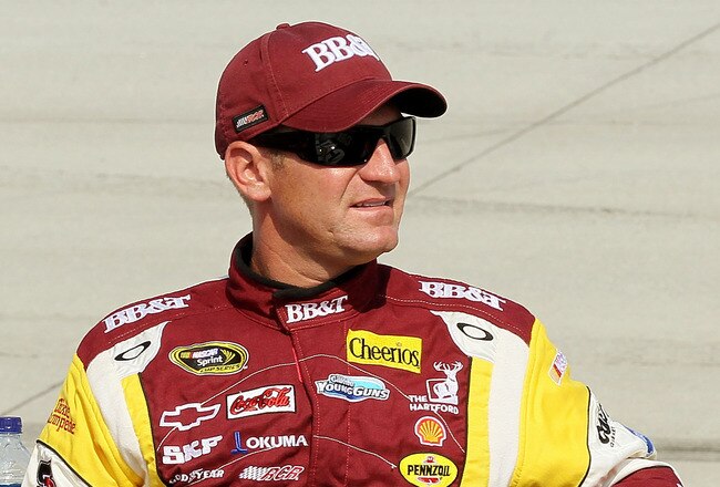 DOVER, DE - SEPTEMBER 24:  Clint Bowyer, driver of the #33 BB&T Chevrolet, stands on the grid during qualifying for the NASCAR Sprint Cup Series AAA 400 at Dover International Speedway on September 24, 2010 in Dover, Delaware.  (Photo by Jim McIsaac/Getty Images for NASCAR)