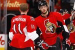 OTTAWA, ON - APRIL 24:  Jason Spezza #19 and Daniel Alfredsson #11 of the Ottawa Senators talk during a break in action against the Pittsburgh Penguins in Game 6 of the Eastern Conference Quaterfinals of the 2010 Stanley Cup Playoffs at Scotiabank Place on April 24, 2010 in Ottawa, Canada.  (Photo by Phillip MacCallum/Getty Images)