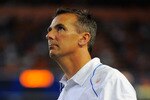 GAINESVILLE, FL - SEPTEMBER 25:  Head coach Urban Meyer of the Florida Gators looks toward the scoreboard while taking on the Kentucky Wildcats at Ben Hill Griffin Stadium on September 25, 2010 in Gainesville, Florida.  (Photo by Doug Benc/Getty Images)