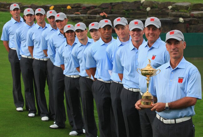 NEWPORT, WALES - SEPTEMBER 28:  (L-R)  Matt Kuchar, Bubba Watson, Dustin Johnson, Stewart Cink, Jeff Overton, Rickie Fowler, Zach Johnson, Hunter Mahan, Tiger Woods, Jim Furyk, Steve Stricker, Phil Mickelson and Team Captain Corey Pavin pose with the trophy during the USA Team Photocall prior to the 2010 Ryder Cup at the Celtic Manor Resort on September 28, 2010 in Newport, Wales. (Photo by David Cannon/Getty Images)