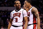 OKLAHOMA CITY - MARCH 18:  (L-R) Anthony Marshall #3, Steve Jones #20 and Tre'Von Willis #33 of the UNLV Rebels reacts after Marshall dunked against the Northern Iowa Panthers during the first round of the 2010 NCAA men's basketball tournament at Ford Center on March 18, 2010 in Oklahoma City, Oklahoma.  (Photo by Ronald Martinez/Getty Images)