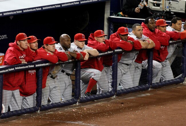 NEW YORK - OCTOBER 25:  The Los Angeles Angels of Anaheim look dejected after being defeated 5-2 by the New York Yankees in the top of the ninth inning of Game Six of the ALCS during the 2009 MLB Playoffs at Yankee Stadium on October 25, 2009 in the Bronx borough of New York City. The New York Yankees won the ALCS series 4-2 over the Los Angeles Angels of Anaheim to capture the American League pennant.  (Photo by Jim McIsaac/Getty Images)