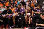 PHOENIX - APRIL 26:  (L-R) LaMarcus Aldridge #12, Marcus Camby #21, Nicolas Batum #88 and Brandon Roy #7 of the Portland Trail Blazers react on the bench during Game Five of the Western Conference Quarterfinals of the 2010 NBA Playoffs against the Phoenix Suns at US Airways Center on April 26, 2010 in Phoenix, Arizona. The Suns defeated the Trail Blazers 107-88 to take a 3-2 series lead.  NOTE TO USER: User expressly acknowledges and agrees that, by downloading and or using this photograph, User is consenting to the terms and conditions of the Getty Images License Agreement.  (Photo by Christian Petersen/Getty Images)