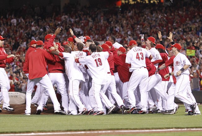 CINCINNATI, OH - SEPTEMBER 28: The Cincinnati Reds celebrate following the game against the Houston Astros at Great American Ball Park on September 28, 2010 in Cincinnati, Ohio. The Reds won 3-2 to clinch the NL Central Division title. (Photo by Joe Robbins/Getty Images)