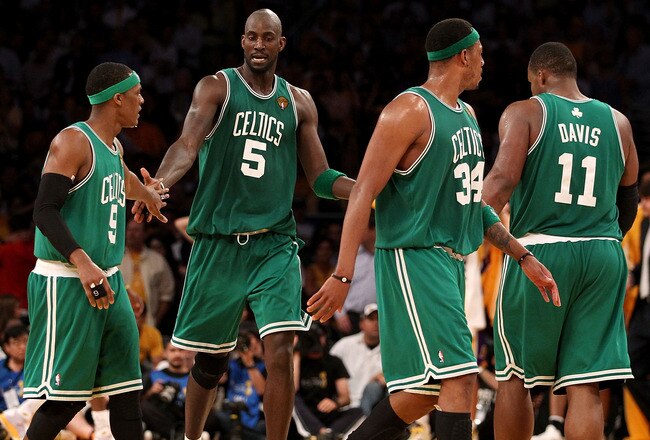 LOS ANGELES, CA - JUNE 17:  (L-R) Rajon Rondo #9, Kevin Garnett #5, Paul Pierce #34 and Glen Davis #11 of the Boston Celtics walk across the court in the second half against the Los Angeles Lakers in Game Seven of the 2010 NBA Finals at Staples Center on June 17, 2010 in Los Angeles, California.  NOTE TO USER: User expressly acknowledges and agrees that, by downloading and/or using this Photograph, user is consenting to the terms and conditions of the Getty Images License Agreement.  (Photo by Christian Petersen/Getty Images)