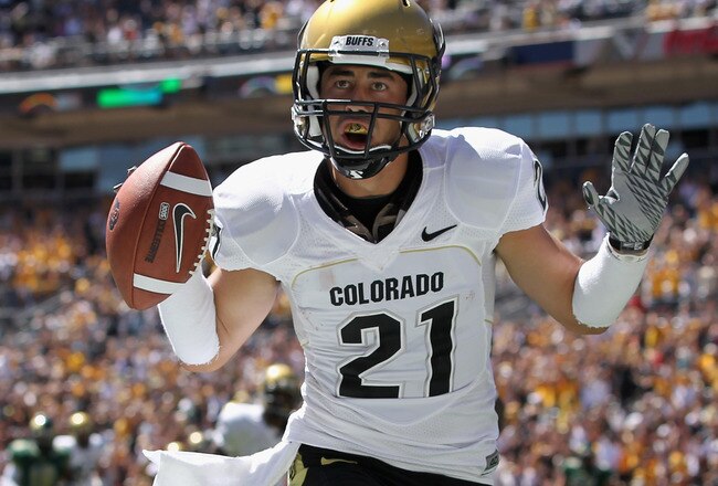 DENVER - SEPTEMBER 04:  Wide receiver Scotty McKnight #21 of the Colorado Buffaloes celebrates 27 yard touchdown reception to give the Buffs a 14-0 lead over the Colorado State Rams in the second quarter of the Rocky Mountain Showdown at INVESCO Field at Mile High on September 4, 2010 in Denver, Colorado.  (Photo by Doug Pensinger/Getty Images)