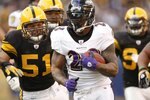 PITTSBURGH - DECEMBER 27:  Willis McGahee #23 of the Baltimore Ravens carries the ball against James Farrior #51 of the Pittsburgh Steelers on December 27, 2009 at Heinz Field in Pittsburgh, Pennsylvania. (Photo by Gregory Shamus/Getty Images)