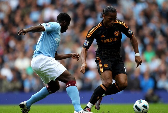 MANCHESTER, ENGLAND - SEPTEMBER 25:  Didier Drogba of Chelsea competes with Kolo Toure of Manchester City during the Barclays Premier League match between Manchester City and Chelsea at the City of Manchester Stadium on September 25, 2010 in Manchester, England. (Photo by Alex Livesey/Getty Images)