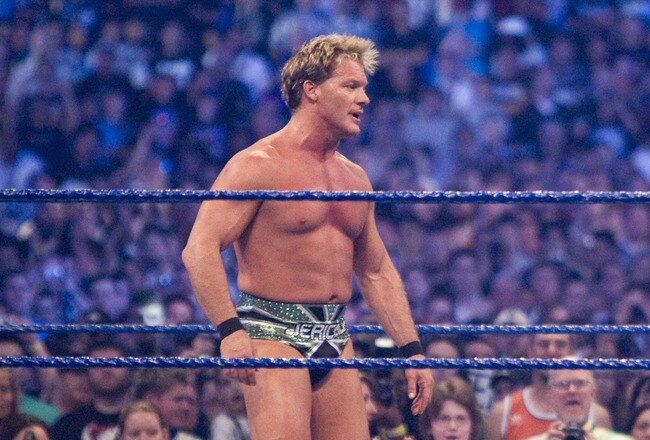 HOUSTON, TX - APRIL 5: (L-R) WWE Superstar Chris Jericho taunts actor Mickey Rourke as they prepare to duel during WrestleMania 25 at Reliant Stadium on April 5, 2009 in Houston, Texas.  (Photo by Bill Olive/Getty Images)