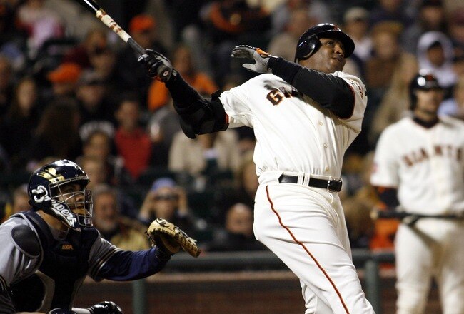 SAN FRANCISCO - AUGUST 24:  Barry Bonds #25 of the San Francisco Giants hits his 761st home run off of Chris Capuano the Milwaukee Brewers during the fourth inning of a game August 24, 2007 at AT&T Park in San Francisco, California.   (Photo by Dino Vournas/Getty Images)