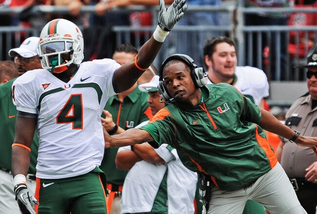 COLUMBUS, OH - SEPTEMBER 11:  Head Coach Randy Shannon of the Miami Hurricanes congratulates Aldarius Johnson #4 of the Hurricanes after a first down catch against the Ohio State Buckeyes at Ohio Stadium on September 11, 2010 in Columbus, Ohio.  (Photo by Jamie Sabau/Getty Images)