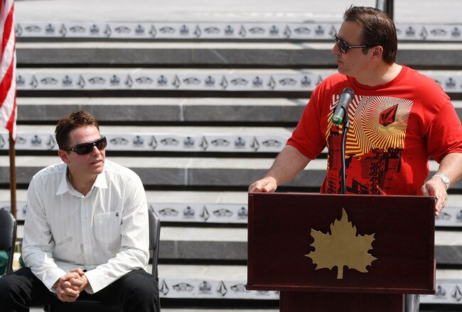 NEW YORK - JUNE 04: George Maloof talks during the Maloof Money Cup ribbon cutting ceremony while brother Joe Maloof listens on June 4, 2010 at Flushing Meadows Corona Park in the Flushing neighborhood of the Queens borough of New York City.  (Photo by Jared Wickerham/Getty Images)