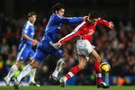 LONDON - NOVEMBER 30:  Robin Van Persie of Arsenal is challenged by Michael Ballack of Chelsea during the Barclays Premier League match between Chelsea and Arsenal at Stamford Bridge on November 30, 2008 in London, England.  (Photo by Mike Hewitt/Getty Images)