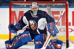 UNIONDALE, NY - SEPTEMBER 21: Rick DiPietro #39 of the New York Islanders defends the net during a training camp session on September 21, 2010 at Nassau Coliseum in Uniondale.  (Photo by Mike Stobe/Getty Images)