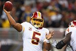 ST. LOUIS - SEPTEMBER 26: Donavan McNabb #5 of the Washington Redskins passes against the St. Louis Rams at the Edward Jones Dome on September 26, 2010 in St. Louis, Missouri.  The Rams beat the Redskins 30-16.  (Photo by Dilip Vishwanat/Getty Images)