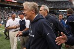 SEATTLE - SEPTEMBER 26:  Head coach Pete Carroll of the Seattle Seahawks heads off the field after defeating the San Diego Chargers 27-10 at Qwest Field on September 26, 2010 in Seattle, Washington. (Photo by Otto Greule Jr/Getty Images)