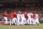 CINCINNATI, OH - SEPTEMBER 28: The Cincinnati Reds celebrate following the game against the Houston Astros at Great American Ball Park on September 28, 2010 in Cincinnati, Ohio. The Reds won 3-2 to clinch the NL Central Division title. (Photo by Joe Robbins/Getty Images)