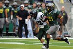 EUGENE, OR - SEPTEMBER 18: Running back LaMichael James #21of the Oregon Ducks heads to the end zone for a touchdown as safety Nathan Snow #22 of the Portland State Vikings gives chase in the first quarter of the game at Autzen Stadium on September 18, 2010 in Eugene, Oregon.  (Photo by Steve Dykes/Getty Images)