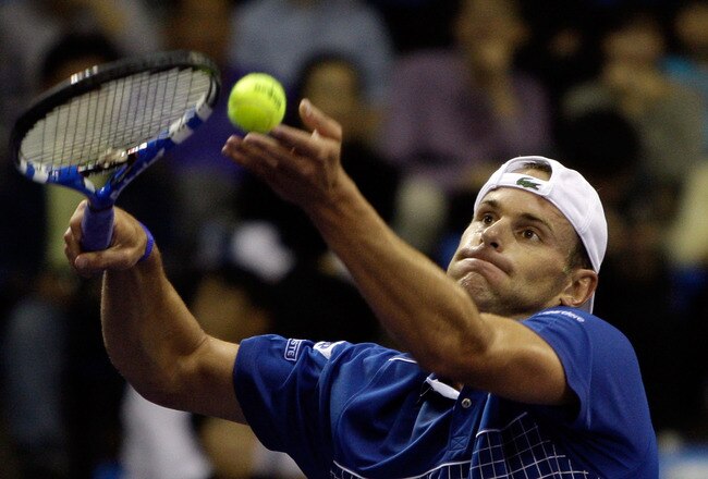 SEOUL, SOUTH KOREA - OCTOBER 02:  Andy Roddick of the United States serves to Novak Djokovic of Serbia during the exhibition match between Novak Djokovic and Andy Roddick on October 2, 2010 in Seoul, South Korea. Djokovic went on to win 6-2, 6-4.  (Photo by Chung Sung-Jun/Getty Images)